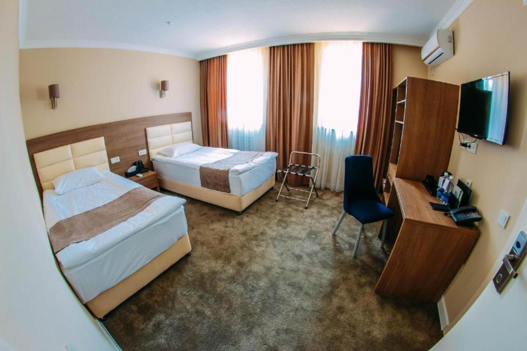 Osh Grand Hotel Chavo Exterior foto